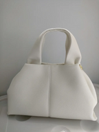 Elegante Damenhandtasche mit gepolstertem Griff und Schulterriemen
